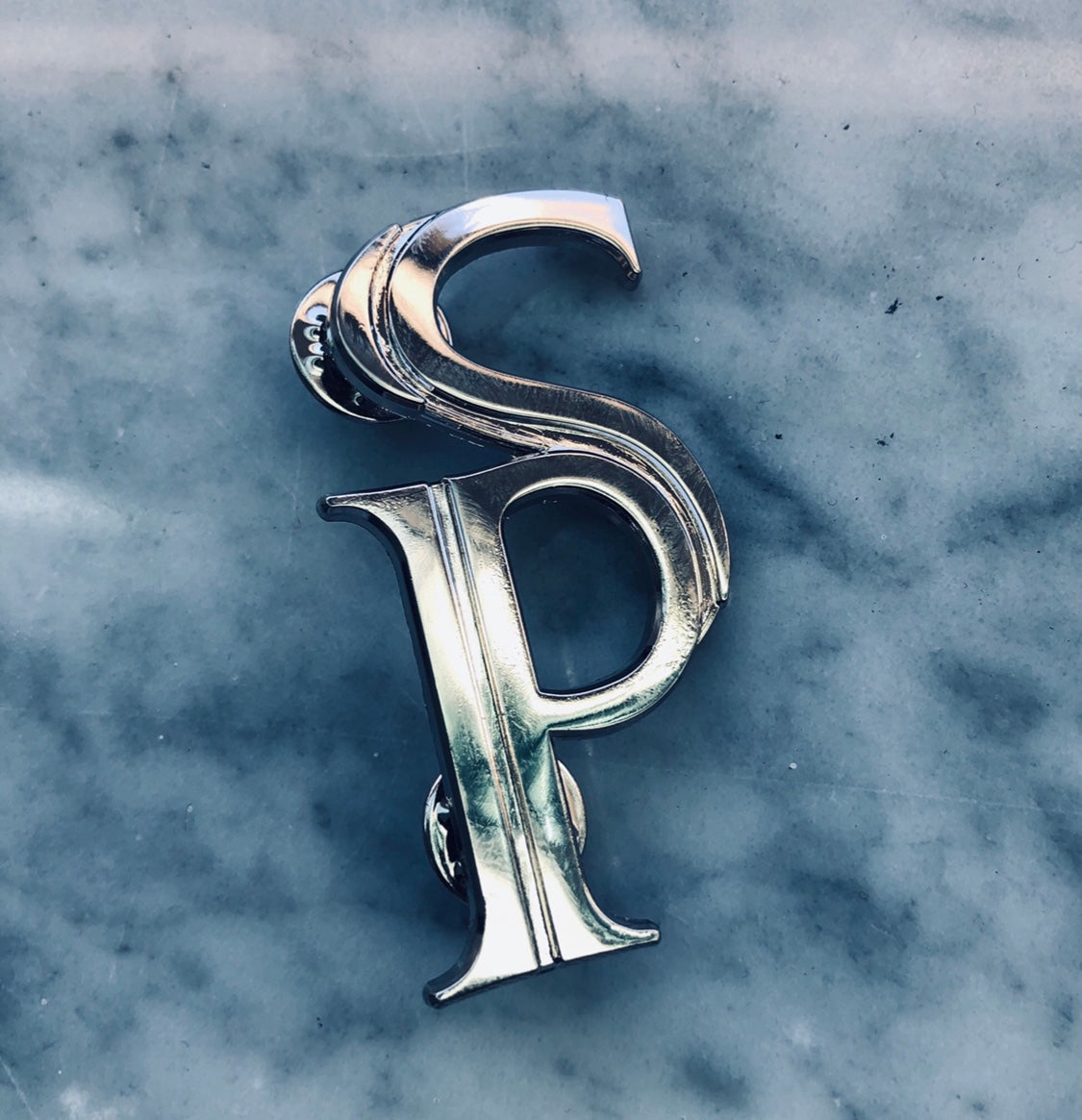 SP Brooch